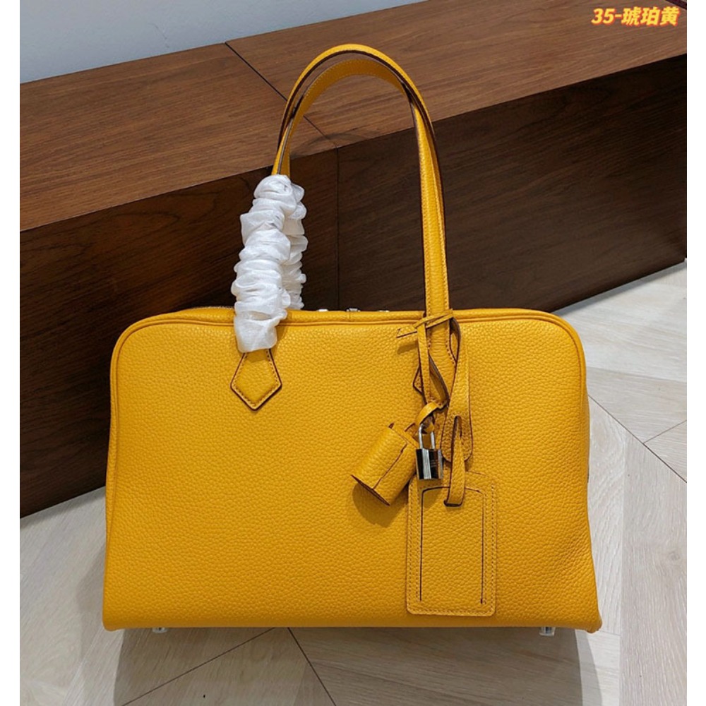 Bolso de Mano de Cuero Vacuno  - Luxury Bags Consignment reseña y precio